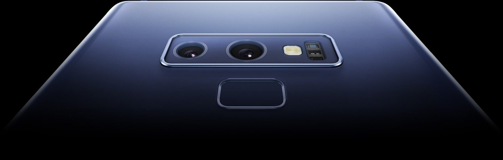 An extreme closeup of Galaxy Note9âs dual lens rear camera and fingerprint scanner