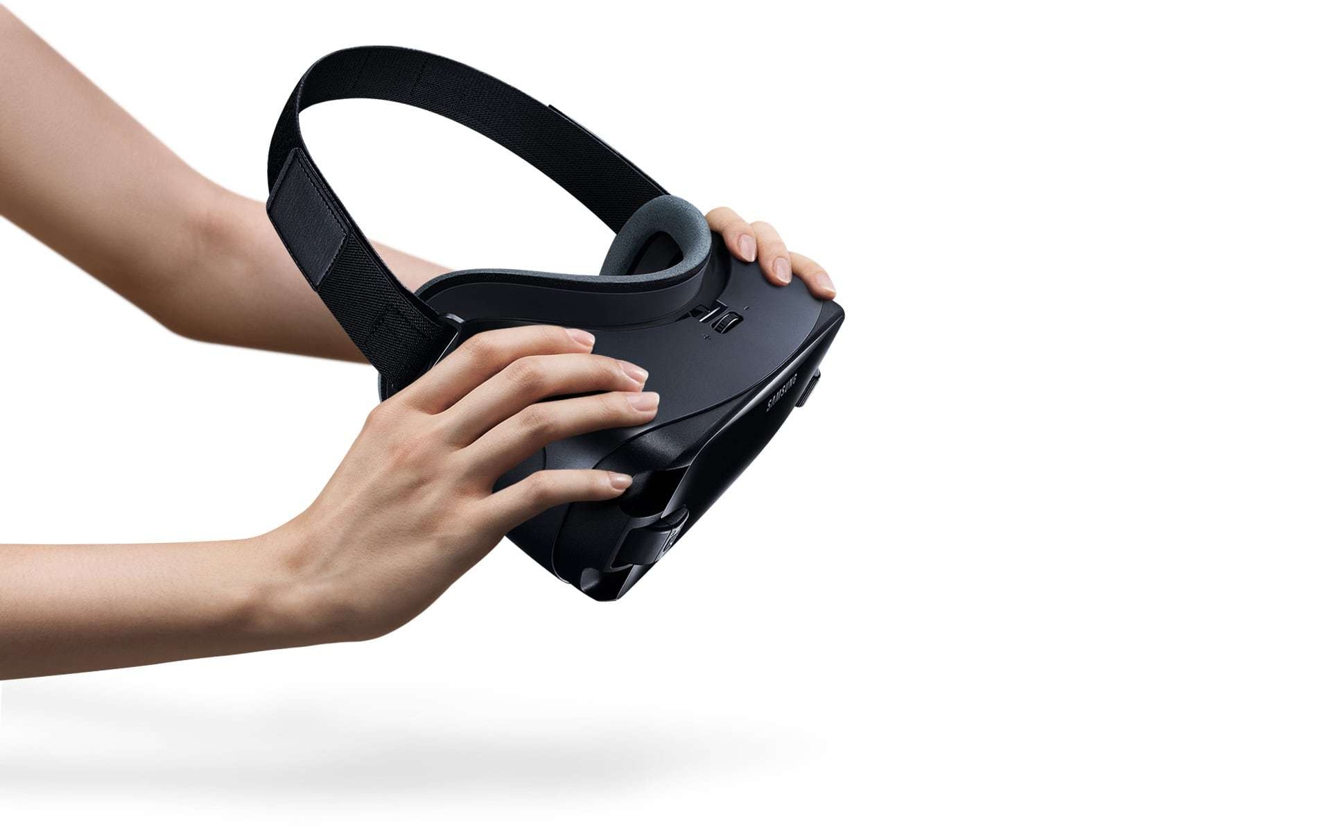 Hands holding the Gear VR as if to put it on